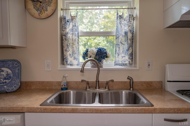 136 Timber Ridge Dr, Forest, VA 24551 - kitchen featuring wall chimney exhaust hood, white cabinets, washer / clothes dryer, and light countertops