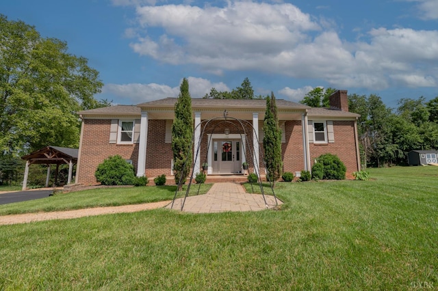 136 Timber Ridge Dr, Forest, VA 24551 - view of front of property with brick siding, a chimney, a front yard, and a gazebo
