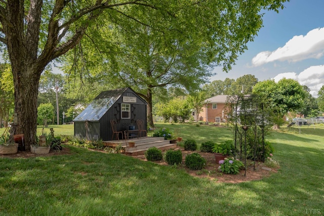 136 Timber Ridge Dr, Forest, VA 24551 - view of green lawn featuring a storage shed