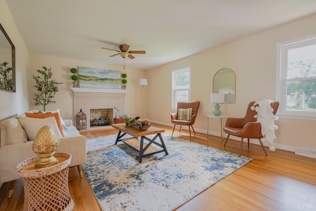 136 Timber Ridge Dr, Forest, VA 24551 - living room with plenty of natural light, ceiling fan, wood finished floors, and a fireplace