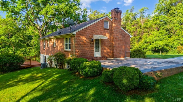 200 Middleboro Pl, Lynchburg, VA 24502 - back of house featuring a chimney, a lawn, brick siding, and a deck