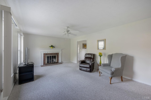 200 Middleboro Pl, Lynchburg, VA 24502 - living area featuring carpet floors, a ceiling fan, and a brick fireplace