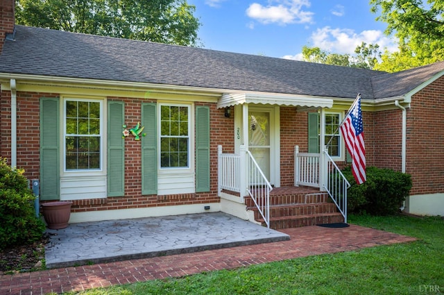 200 Middleboro Pl, Lynchburg, VA 24502 - view of front of home with roof with shingles, brick siding, and a patio area