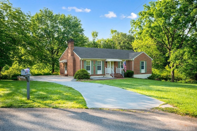 200 Middleboro Pl, Lynchburg, VA 24502 - single story home with a chimney, concrete driveway, brick siding, and a front lawn