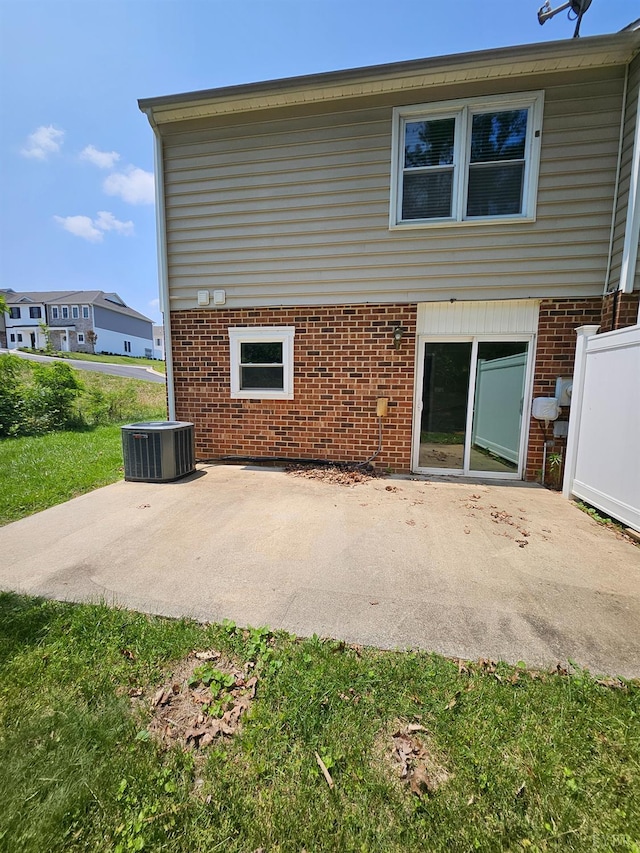 542 Leesville Rd Unit 104, Lynchburg, VA 24502 - rear view of house featuring a patio area and brick siding