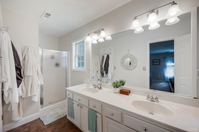 1168 Macon Loop, Lynchburg, VA 24503 - bathroom featuring a shower with shower door, double vanity, and tile patterned flooring