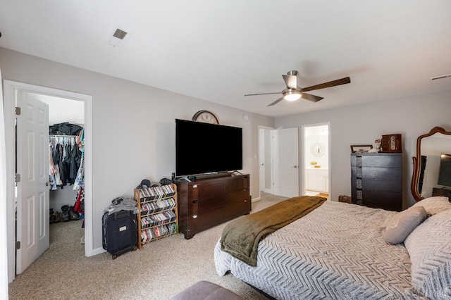 1168 Macon Loop, Lynchburg, VA 24503 - bedroom featuring light colored carpet, a spacious closet, a closet, ceiling fan, and connected bathroom