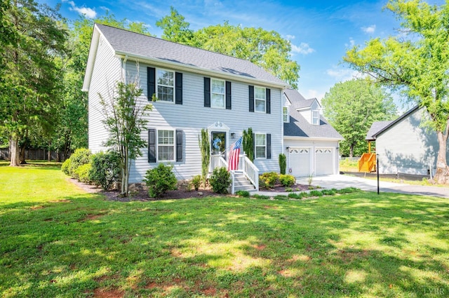 1168 Macon Loop, Lynchburg, VA 24503 - colonial house with driveway, an attached garage, and a front lawn