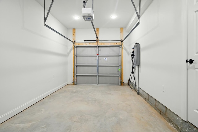 1036 Brownstone Dr, Forest, VA 24551 - garage with a garage door opener and baseboards