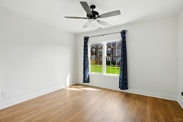 1036 Brownstone Dr, Forest, VA 24551 - empty room with ceiling fan and wood finished floors