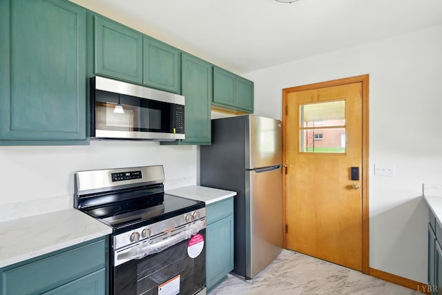 102 SE St, Brookneal, VA 24528 - kitchen featuring appliances with stainless steel finishes, light marble finish floors, and light stone counters