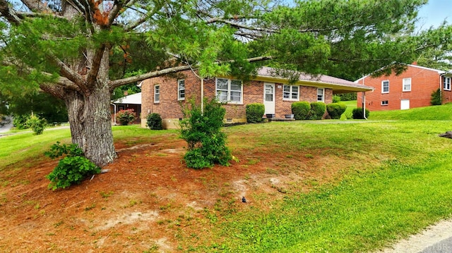 102 SE St, Brookneal, VA 24528 - view of front of house with a front lawn and brick siding