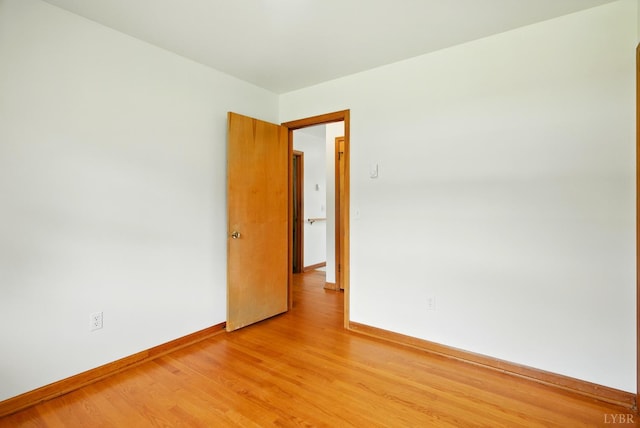 102 SE St, Brookneal, VA 24528 - unfurnished room featuring baseboards and light wood-style flooring