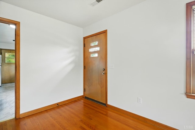 102 SE St, Brookneal, VA 24528 - entrance foyer with wood finished floors and healthy amount of natural light