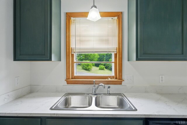 102 SE St, Brookneal, VA 24528 - kitchen featuring green cabinetry and pendant lighting