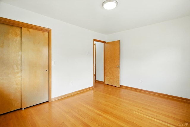 102 SE St, Brookneal, VA 24528 - unfurnished bedroom with light wood-type flooring and a closet