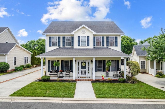 116 Wyndsong Pl, Lynchburg, VA 24502 - colonial-style house with a porch, a front lawn, and a shingled roof