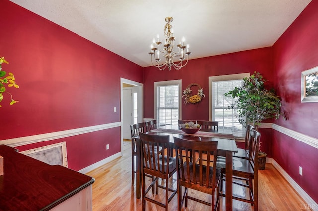 116 Wyndsong Pl, Lynchburg, VA 24502 - dining area with light wood-type flooring and a chandelier