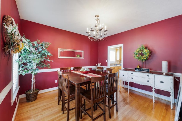 116 Wyndsong Pl, Lynchburg, VA 24502 - dining space featuring wood finished floors and a chandelier