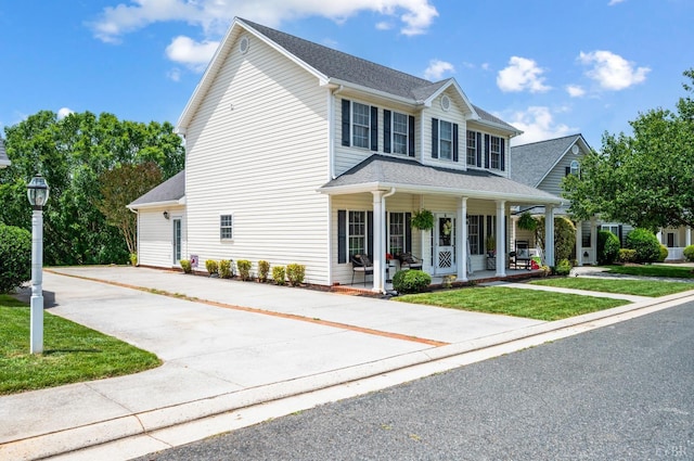 116 Wyndsong Pl, Lynchburg, VA 24502 - colonial-style house with covered porch, driveway, and a front yard