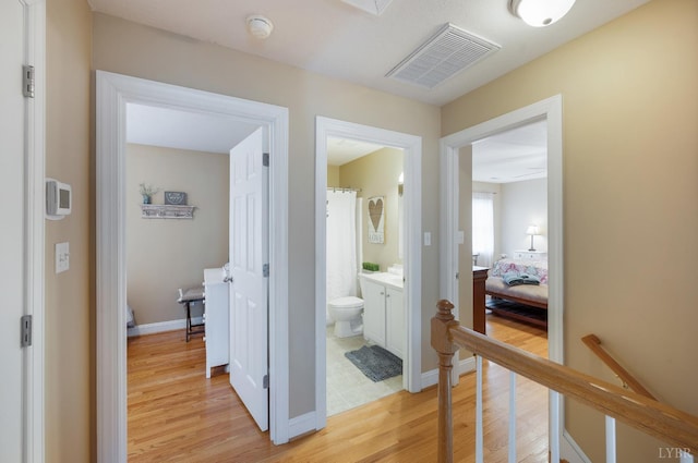 116 Wyndsong Pl, Lynchburg, VA 24502 - hall featuring light wood-style flooring and an upstairs landing