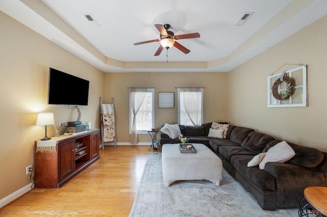 116 Wyndsong Pl, Lynchburg, VA 24502 - living area with a ceiling fan, a tray ceiling, and light wood finished floors