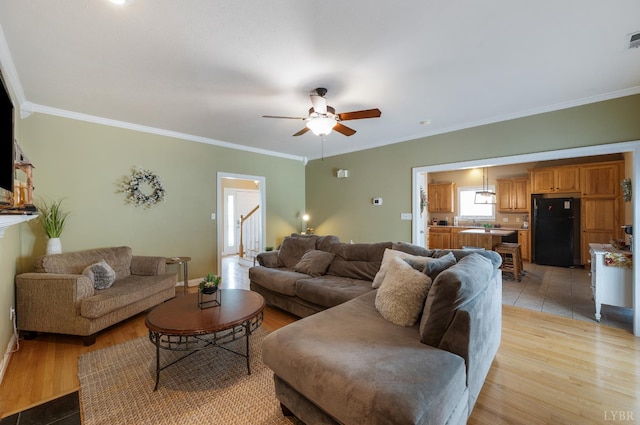116 Wyndsong Pl, Lynchburg, VA 24502 - living room featuring crown molding, ceiling fan, and light wood finished floors