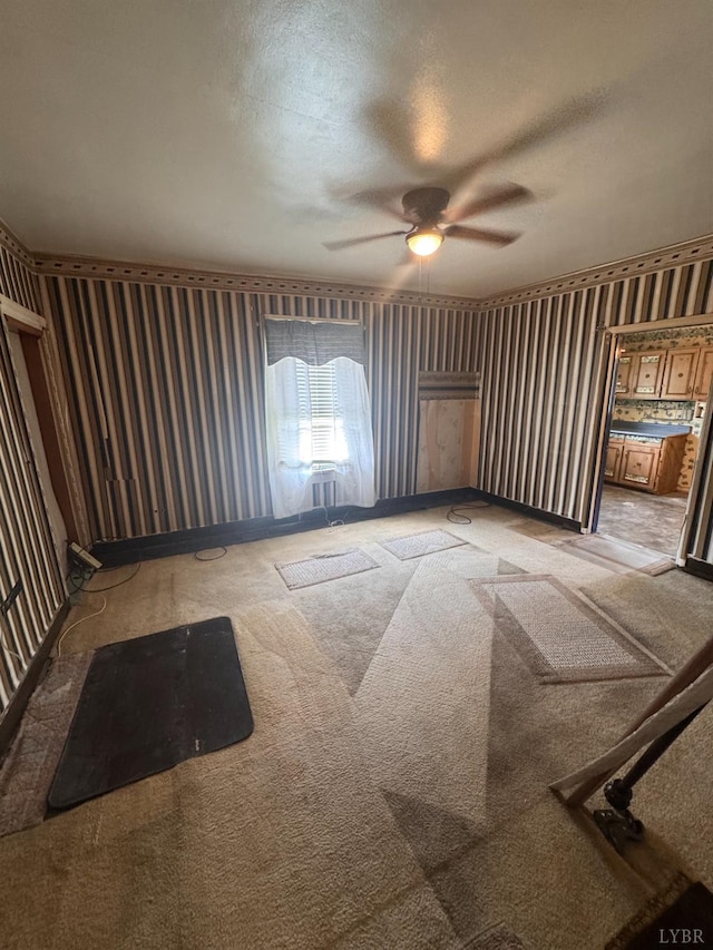512 Polk St, Lynchburg, VA 24504 - unfurnished living room featuring light colored carpet, a ceiling fan, a textured ceiling, and wallpapered walls