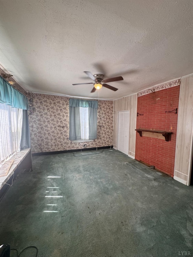 512 Polk St, Lynchburg, VA 24504 - unfurnished living room featuring carpet flooring, ceiling fan, a textured ceiling, and wallpapered walls
