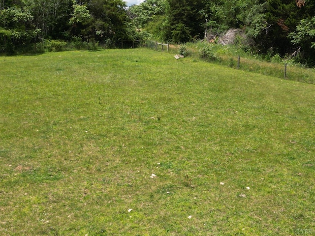 8288 Red House Rd, Phenix, VA 23959 - view of grassy yard featuring a view of trees