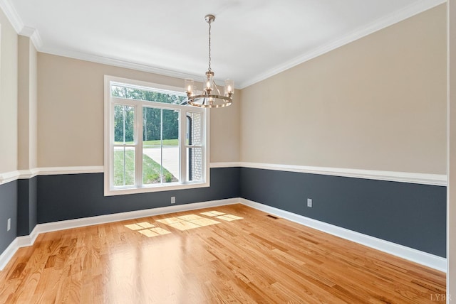 1290 Ivy Creek Dr, Forest, VA 24551 - spare room with a chandelier, wood finished floors, and crown molding
