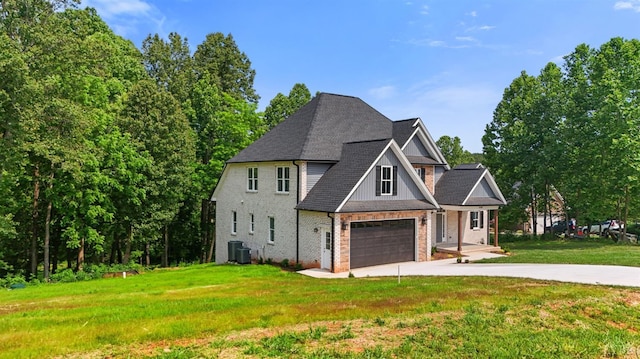 1290 Ivy Creek Dr, Forest, VA 24551 - view of front of property featuring concrete driveway, brick siding, a front lawn, and roof with shingles