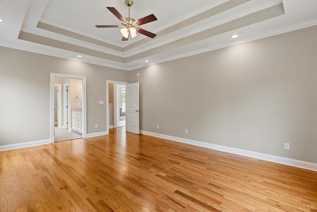 1290 Ivy Creek Dr, Forest, VA 24551 - empty room featuring a raised ceiling, a ceiling fan, light wood-style floors, ornamental molding, and recessed lighting