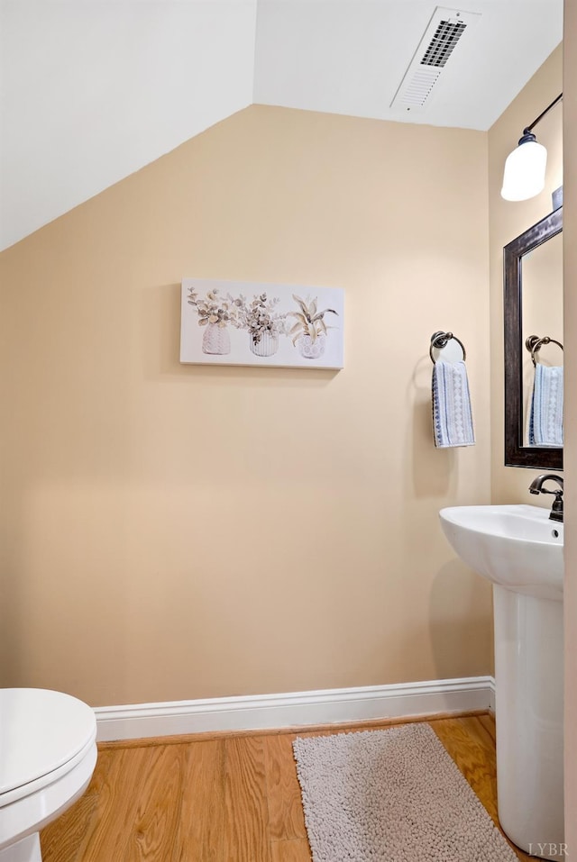 403 Cornerstone St, Lynchburg, VA 24502 - bathroom with wood finished floors and lofted ceiling