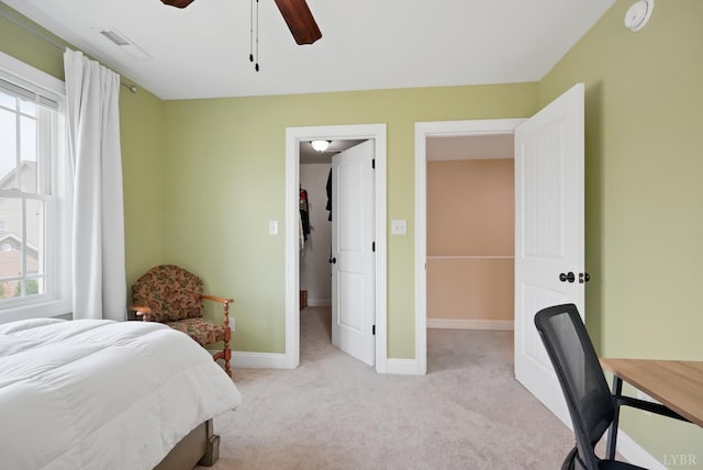 403 Cornerstone St, Lynchburg, VA 24502 - bedroom featuring light colored carpet, an office area, ceiling fan, and a walk in closet