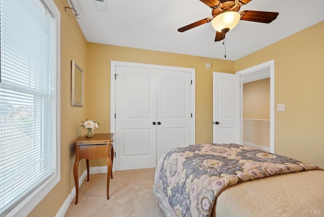 403 Cornerstone St, Lynchburg, VA 24502 - bedroom featuring light carpet, a closet, and a ceiling fan