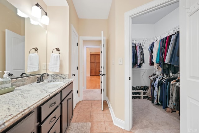 403 Cornerstone St, Lynchburg, VA 24502 - bathroom with vanity, tile patterned flooring, and a walk in closet