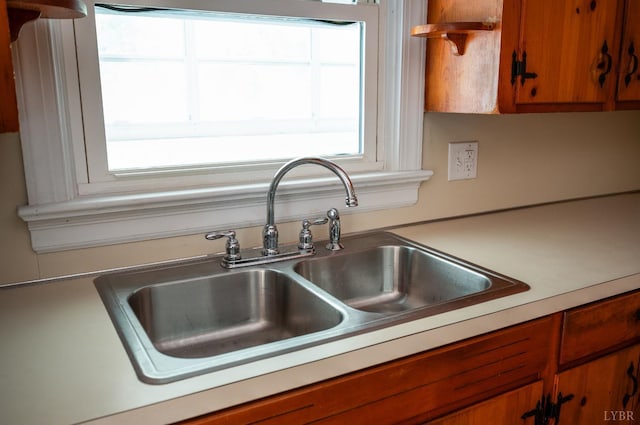 4550 Pumping Station Rd, Appomattox, VA 24522 - kitchen with brown cabinets and light countertops
