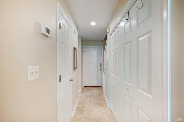 17 Jefferson Village Dr, Forest, VA 24551 - hallway featuring light tile patterned floors, a textured ceiling, and recessed lighting