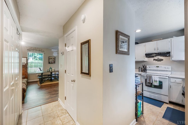 17 Jefferson Village Dr, Forest, VA 24551 - hall with light tile patterned floors, recessed lighting, and a textured ceiling