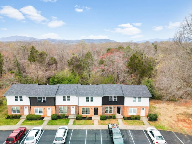 186 Dulwich Dr, Amherst, VA 24521 - view of building exterior with uncovered parking, a forest view, and a mountain view