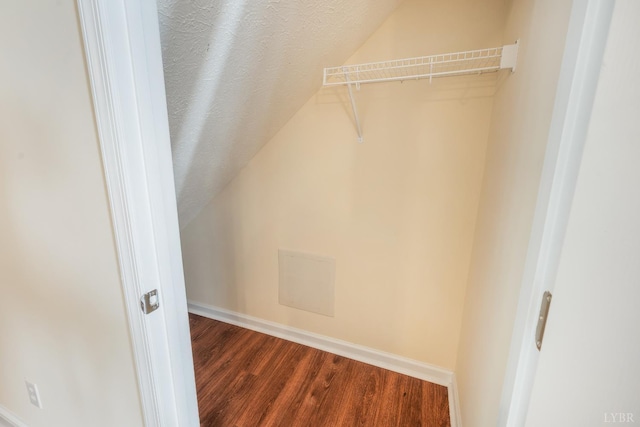 106 Colonnade St, Lynchburg, VA 24502 - walk in closet with vaulted ceiling and dark wood-type flooring