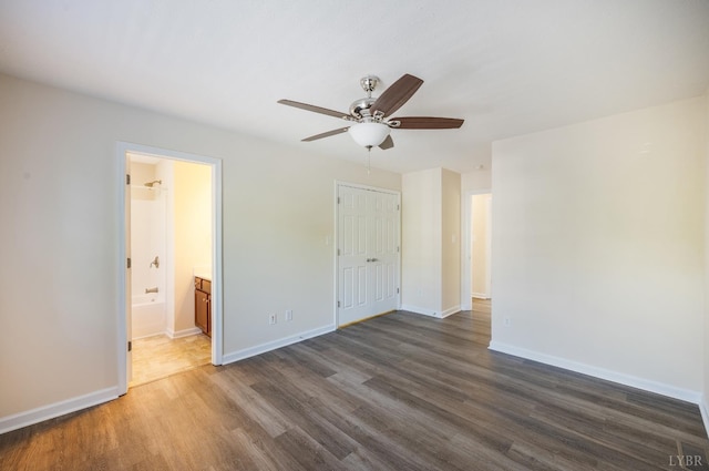 106 Colonnade St, Lynchburg, VA 24502 - unfurnished bedroom with wood finished floors, a closet, connected bathroom, and ceiling fan