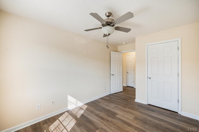 106 Colonnade St, Lynchburg, VA 24502 - unfurnished bedroom featuring dark wood-style flooring and a ceiling fan