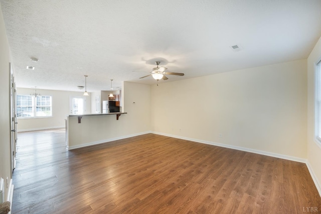 106 Colonnade St, Lynchburg, VA 24502 - unfurnished living room featuring a ceiling fan and dark wood-type flooring
