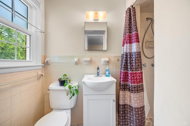1246 Rainbow Forest Dr, Lynchburg, VA 24502 - full bathroom with tile walls, vanity, a tile shower, and a wainscoted wall