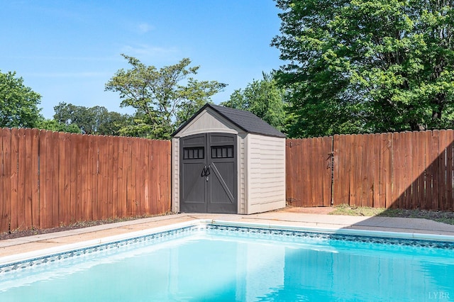 1246 Rainbow Forest Dr, Lynchburg, VA 24502 - view of swimming pool with a storage unit and a fenced backyard