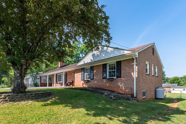 1246 Rainbow Forest Dr, Lynchburg, VA 24502 - ranch-style house with brick siding and a chimney