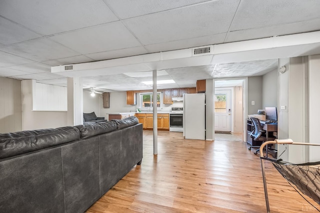 1246 Rainbow Forest Dr, Lynchburg, VA 24502 - living room with light wood-style flooring, a drop ceiling, a desk, and healthy amount of natural light