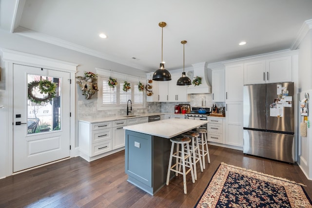1010 Coles Ct, Forest, VA 24551 - kitchen featuring appliances with stainless steel finishes, white cabinets, premium range hood, light countertops, and dark wood-type flooring